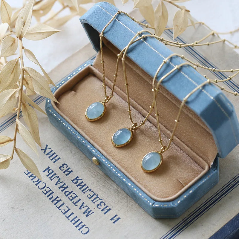 Dainty Oval Aquamarine Cabochon Necklace Pendant with Gold Bezel