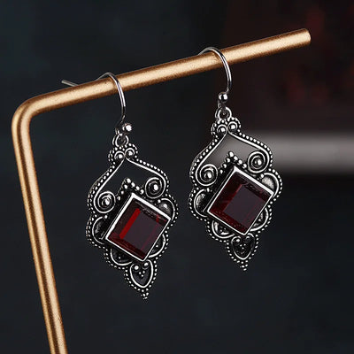 January's Oxidised Silver Garnet Dangle Earrings