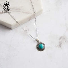 ORSA JEWELS Vintage Round Turquoise Pendant 925 Sterling Silver Oxide Natural Stone Necklace for Women Religious Jewelry GMN46