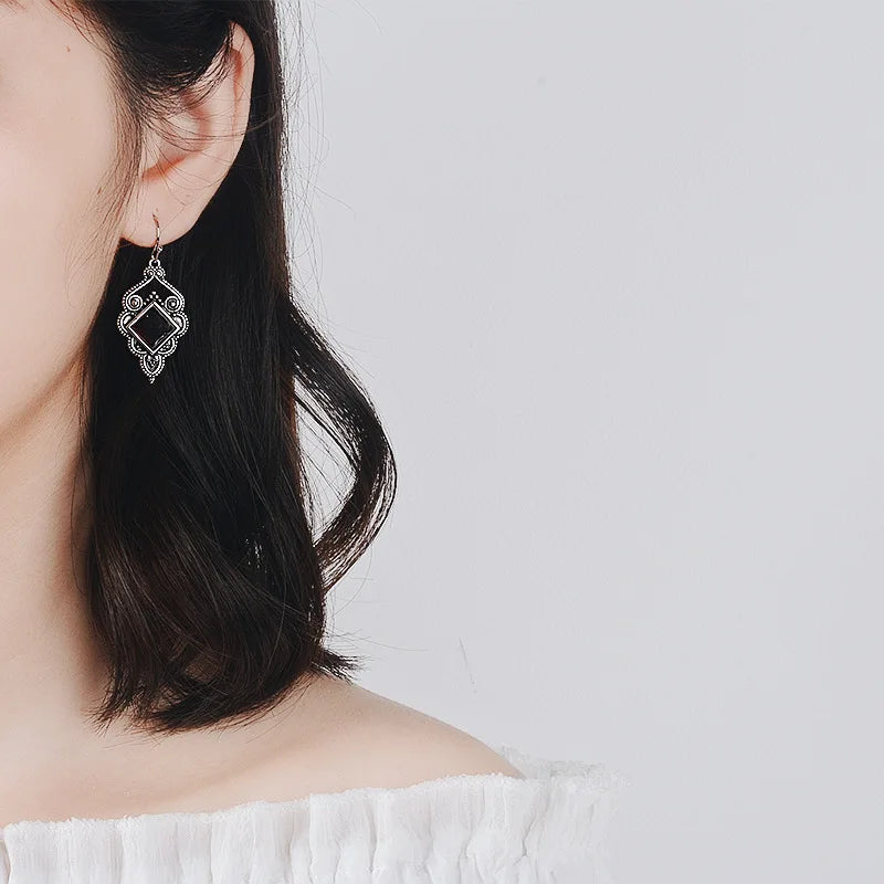 January's Oxidised Silver Garnet Dangle Earrings