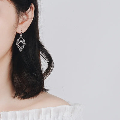 January's Oxidised Silver Garnet Dangle Earrings