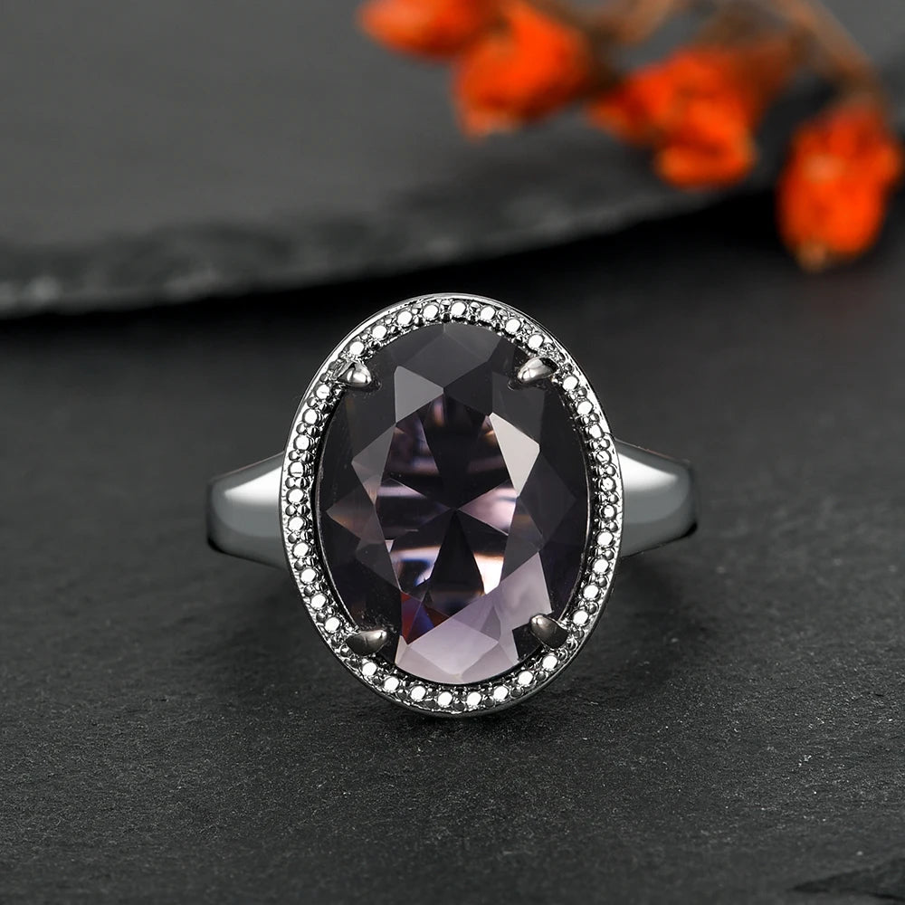 Stylish Oval Amethyst Halo Sterling Silver Ring