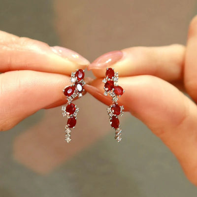 Multiples Ruby Tassel Long Stud Earrings